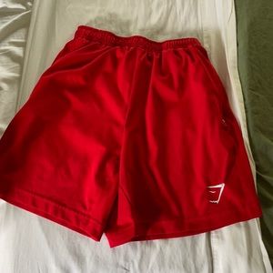 Red 7inch gym shark shorts
